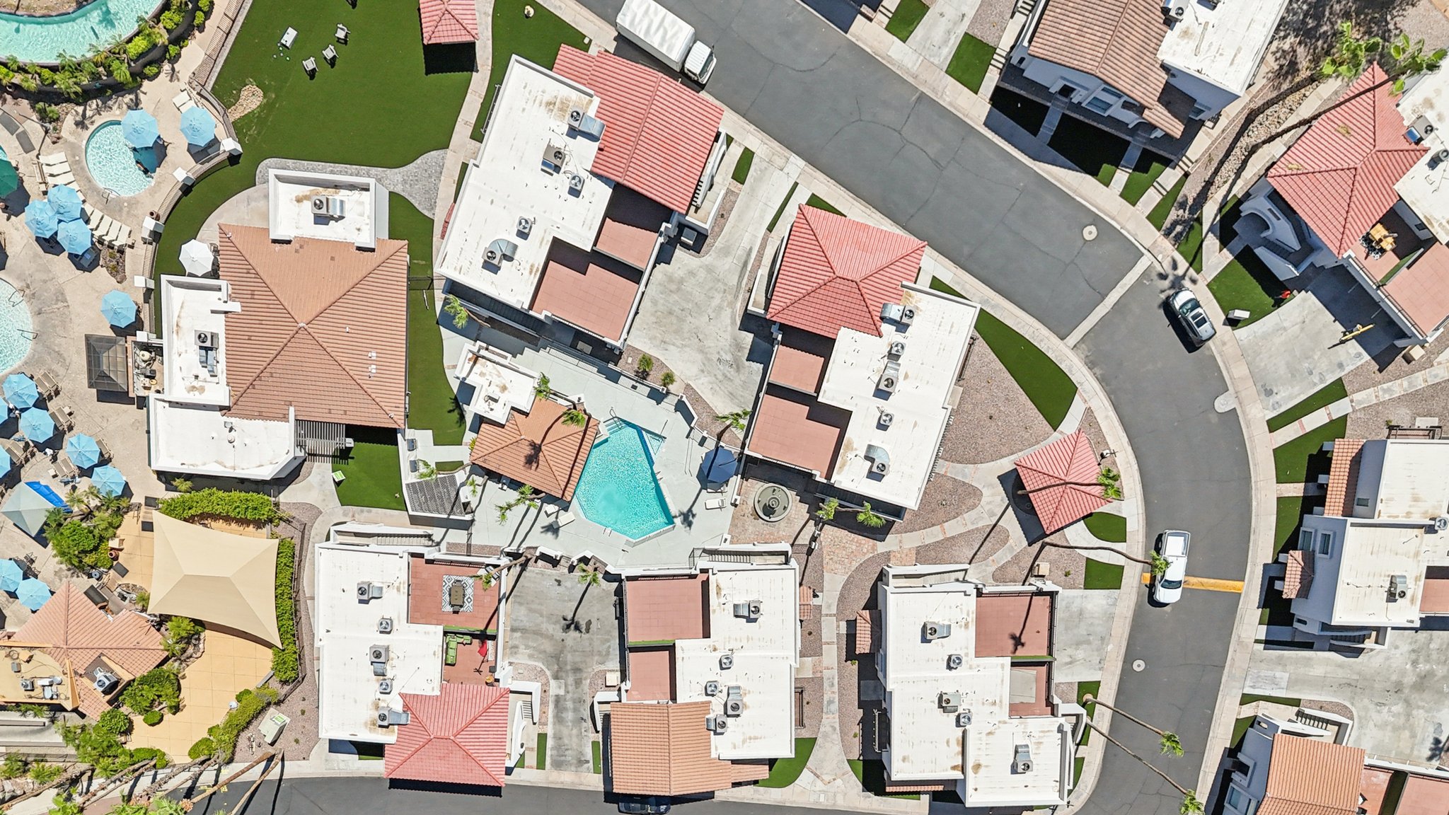 Overhead aerial view of the Views at the Peak townhome community, highlighting the residential buildings and manicured grounds in Phoenix, AZ.