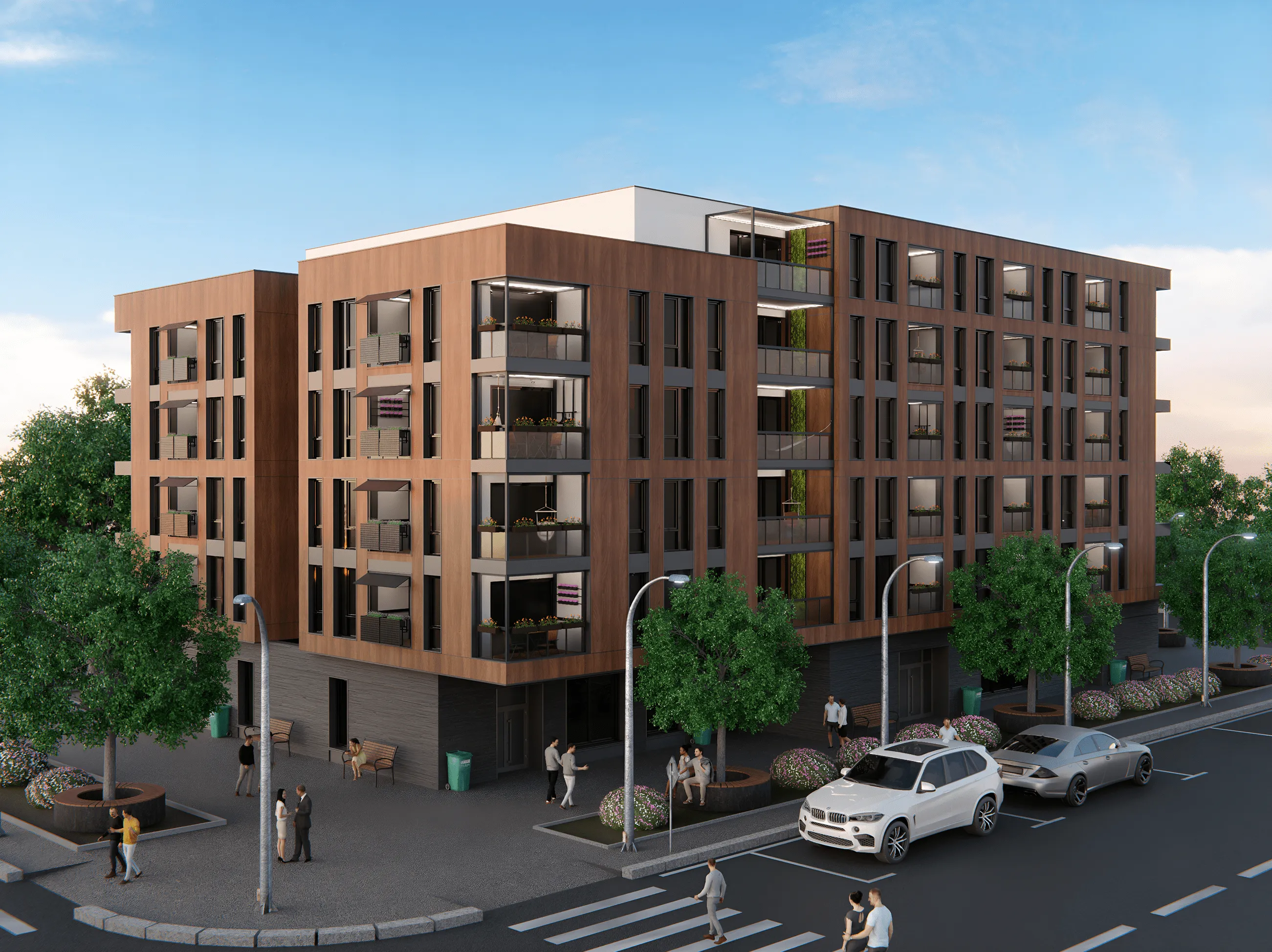 Modern four-story apartment building with wood panel exterior, balconies, street lamps, trees, parked cars, and people walking on the sidewalk.