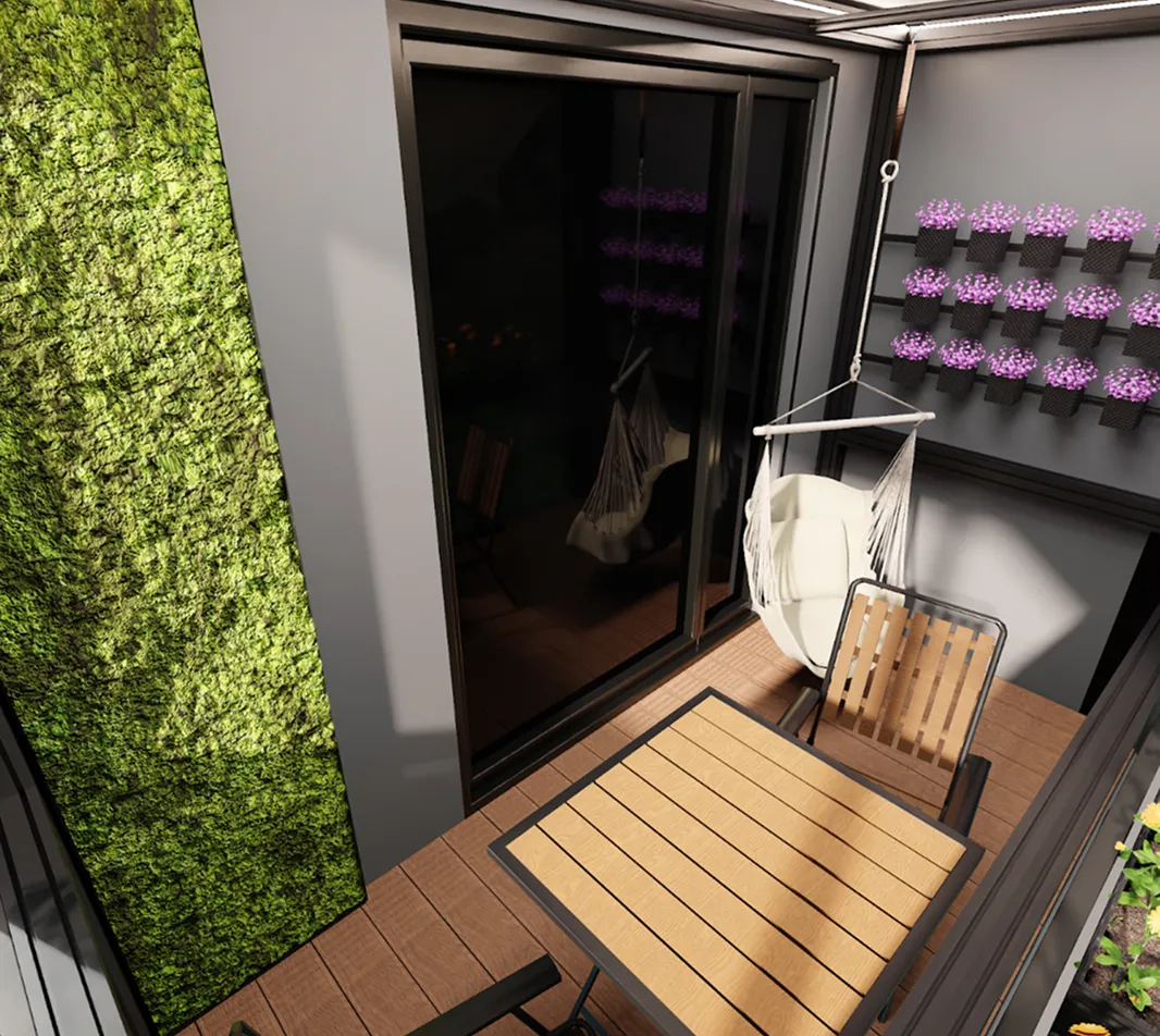 Small balcony with wooden table, chairs, hanging hammock chair, vertical garden on wall, and row of purple flowers in pots.