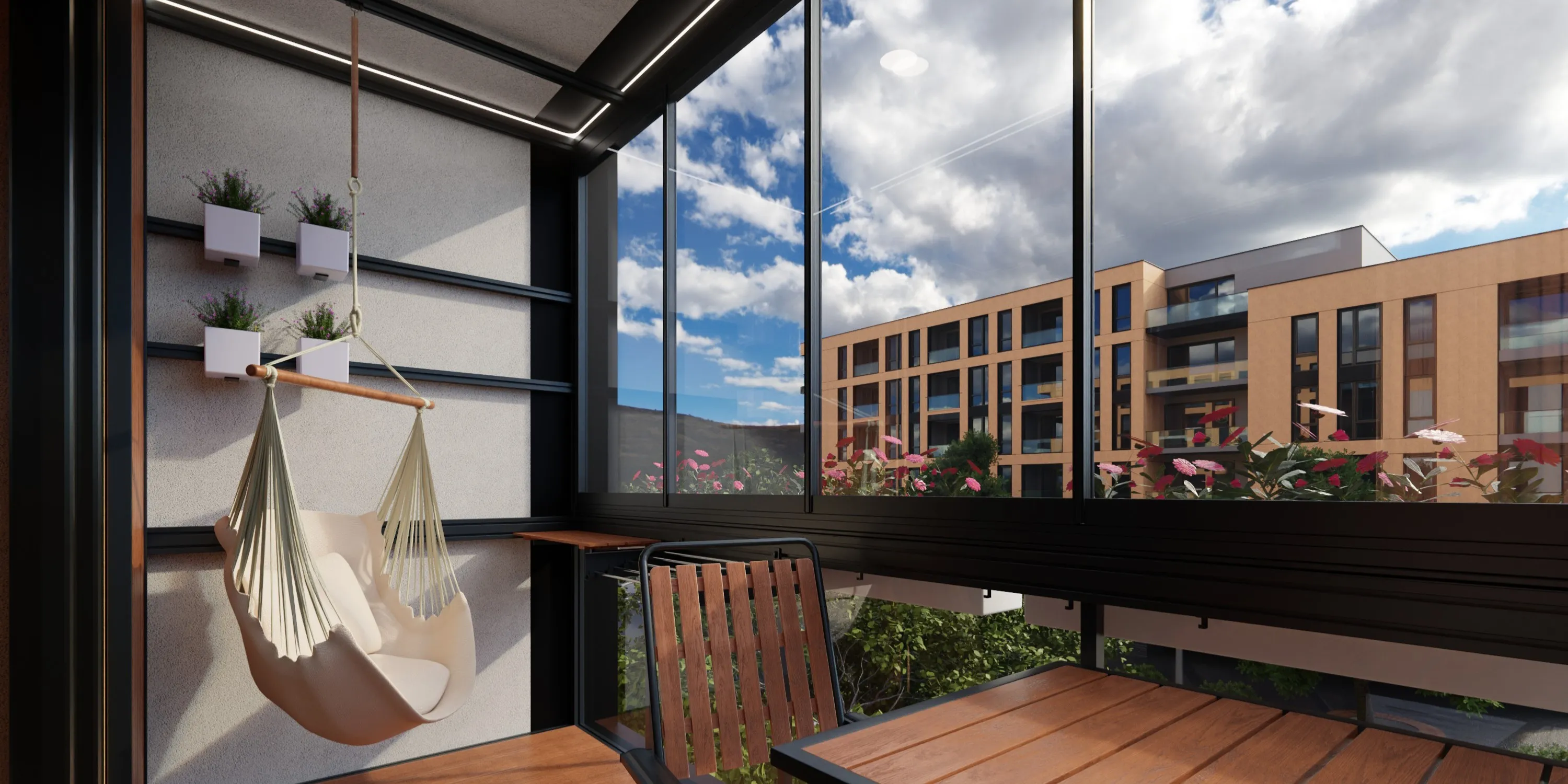 Modern enclosed balcony with a hanging beige chair, wooden table and chair, potted plants, and view of apartment buildings under a partly cloudy sky.