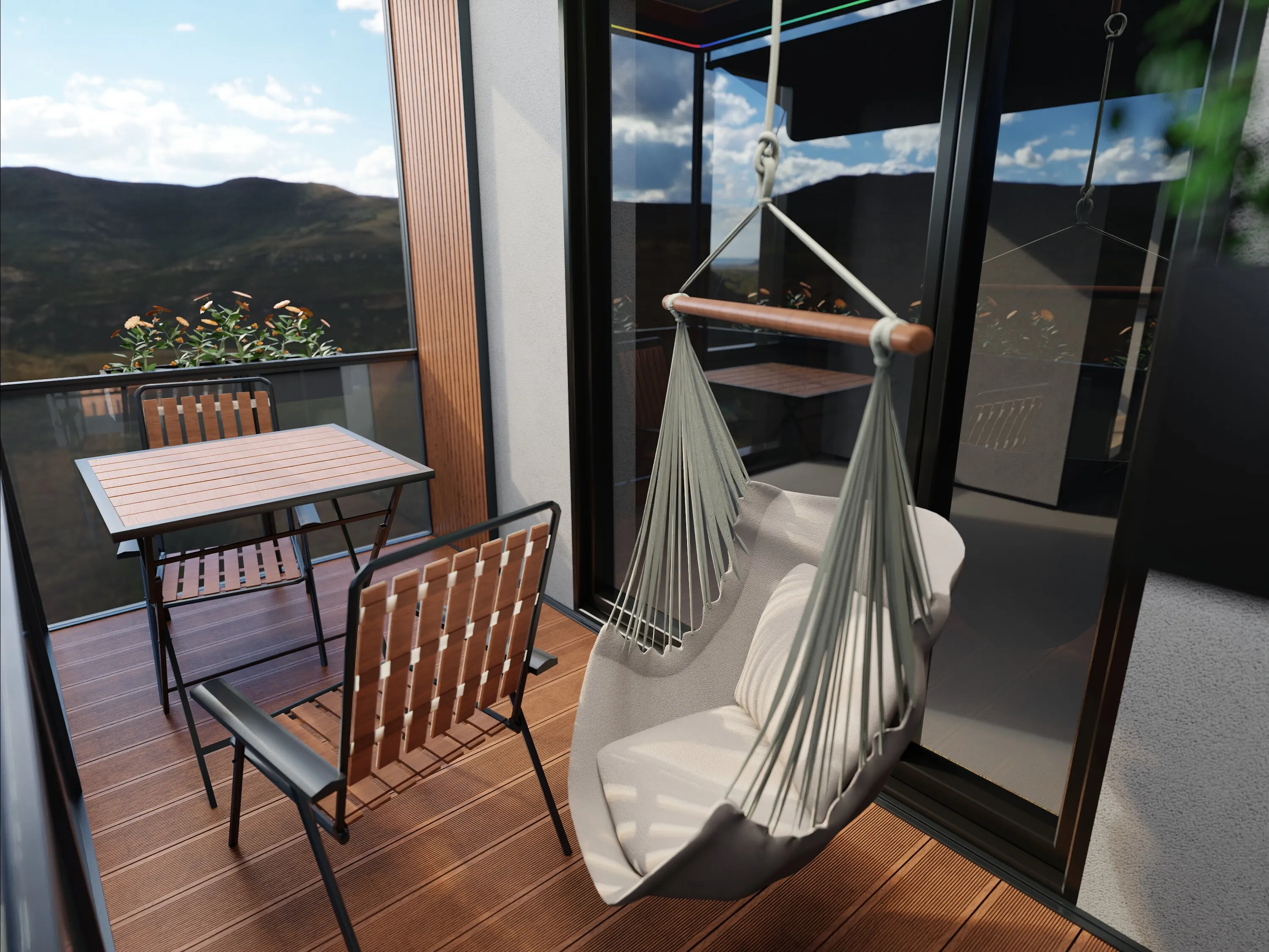 Two gray cushioned folding lounge chairs with wooden frames on a wooden floor in a room with white walls.