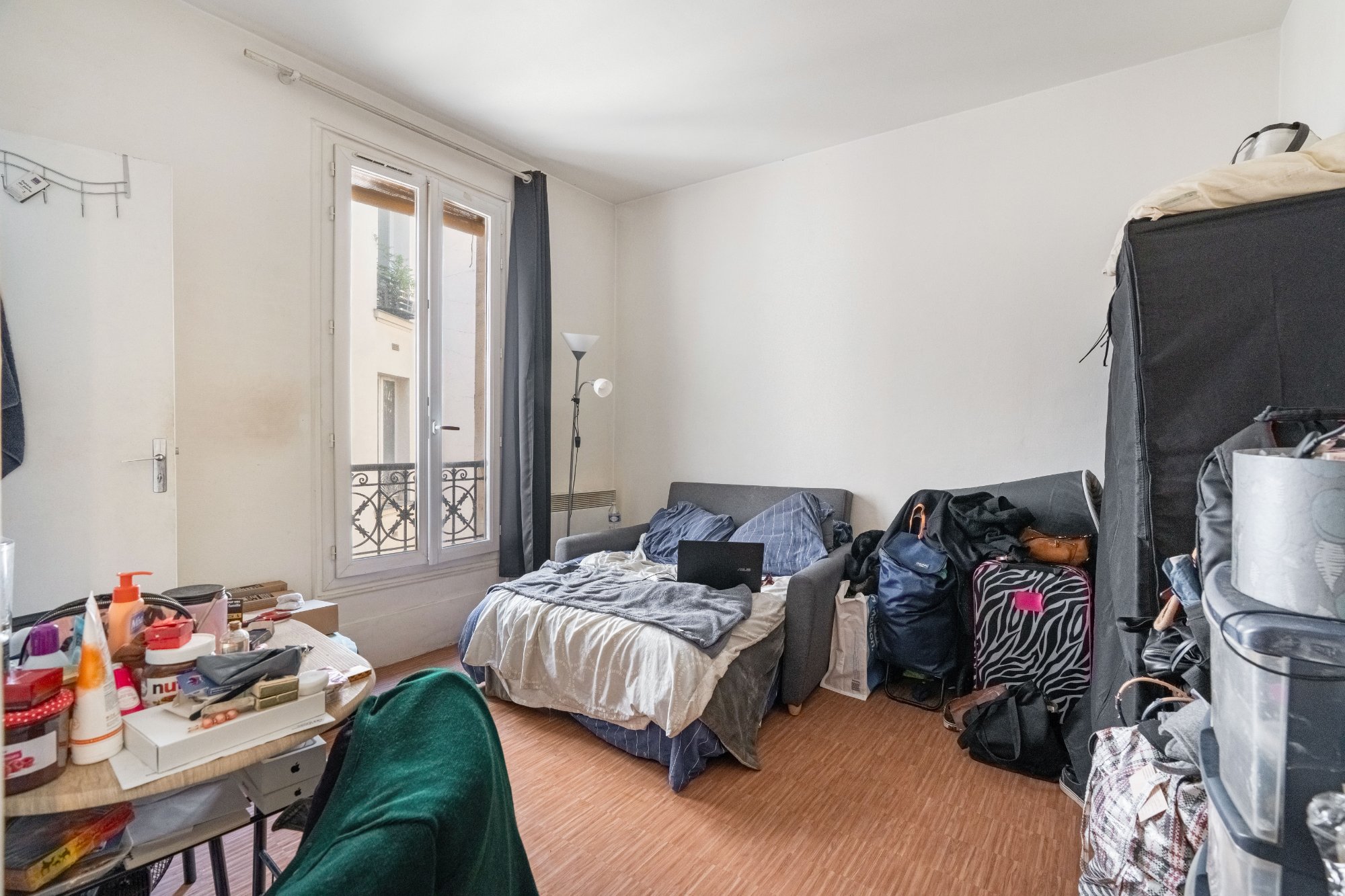 Quartier Paris 11e Arrondissement – Un appartement de 15,01m² Carrez au quatrième étage.