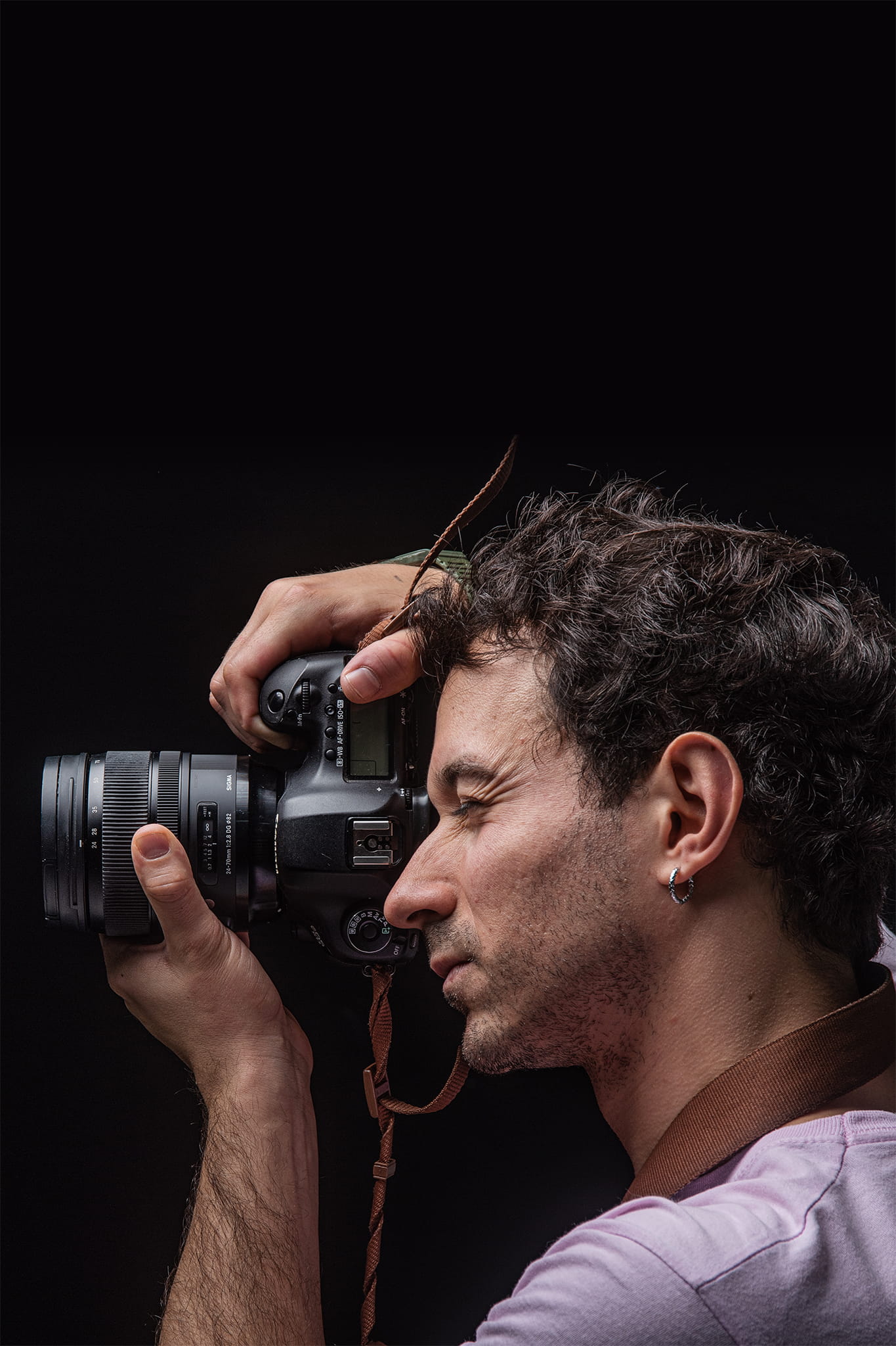 image of author with book collection