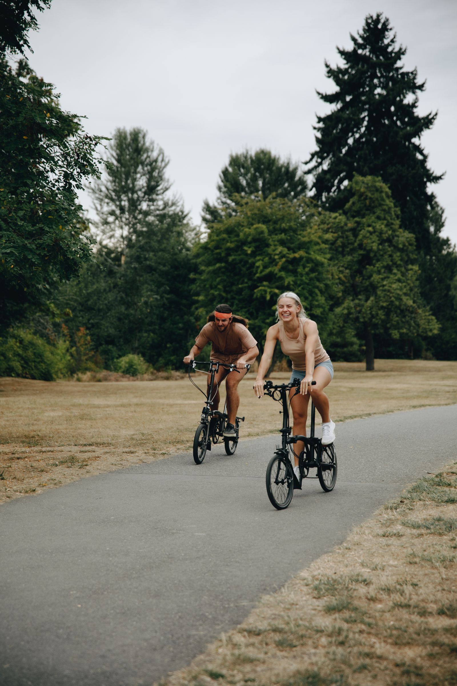 A couple biking outdoors together — staying active on a FitRx weight loss plan
