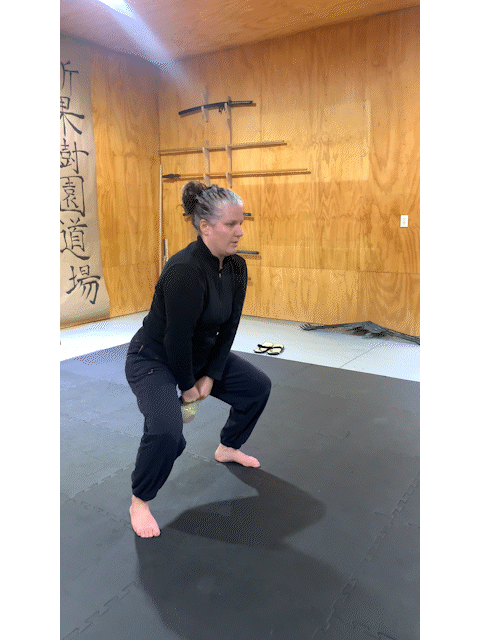 C. swings kettle bell