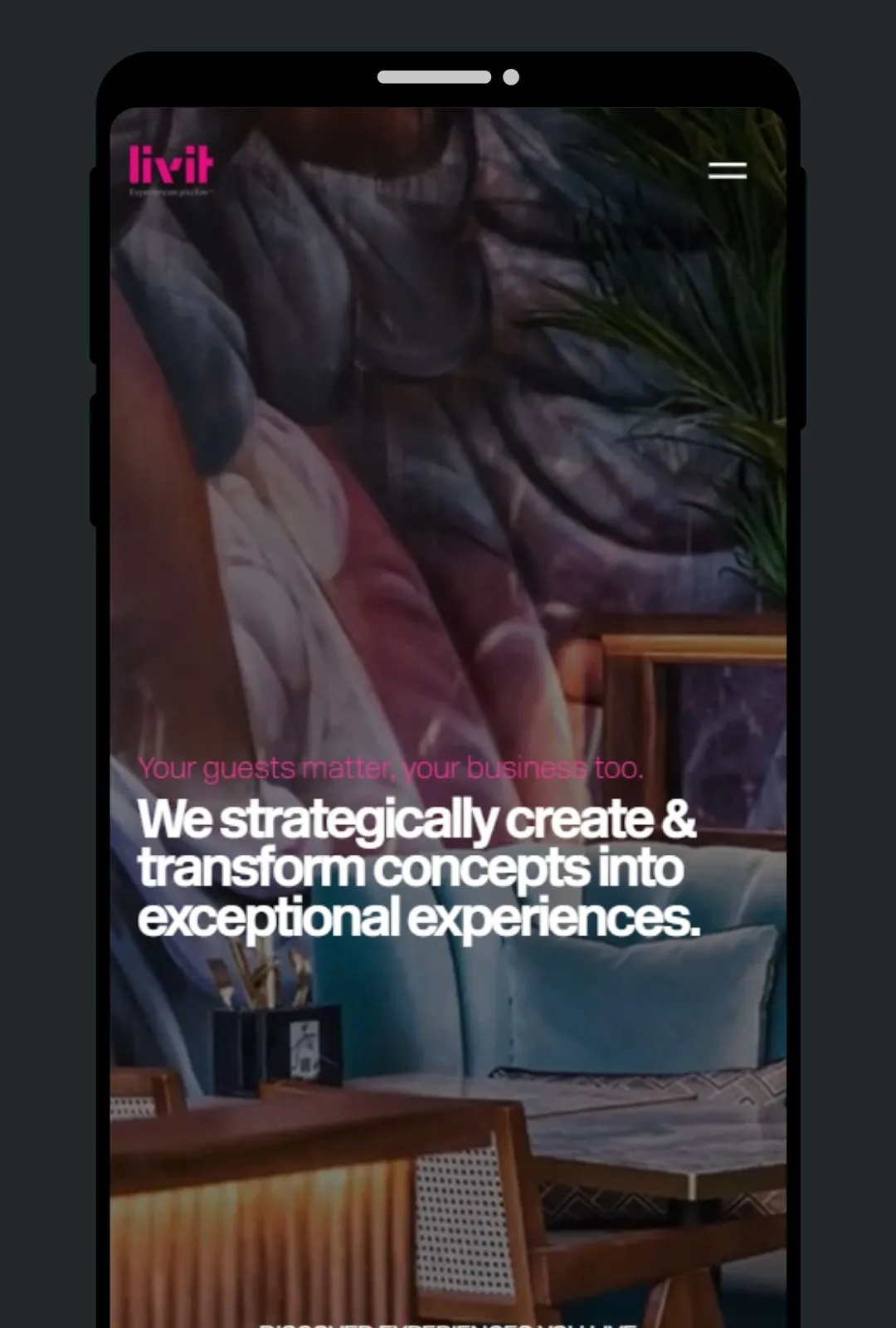 Smartphone screen showing a modern interior with seating and text about creating exceptional experiences.