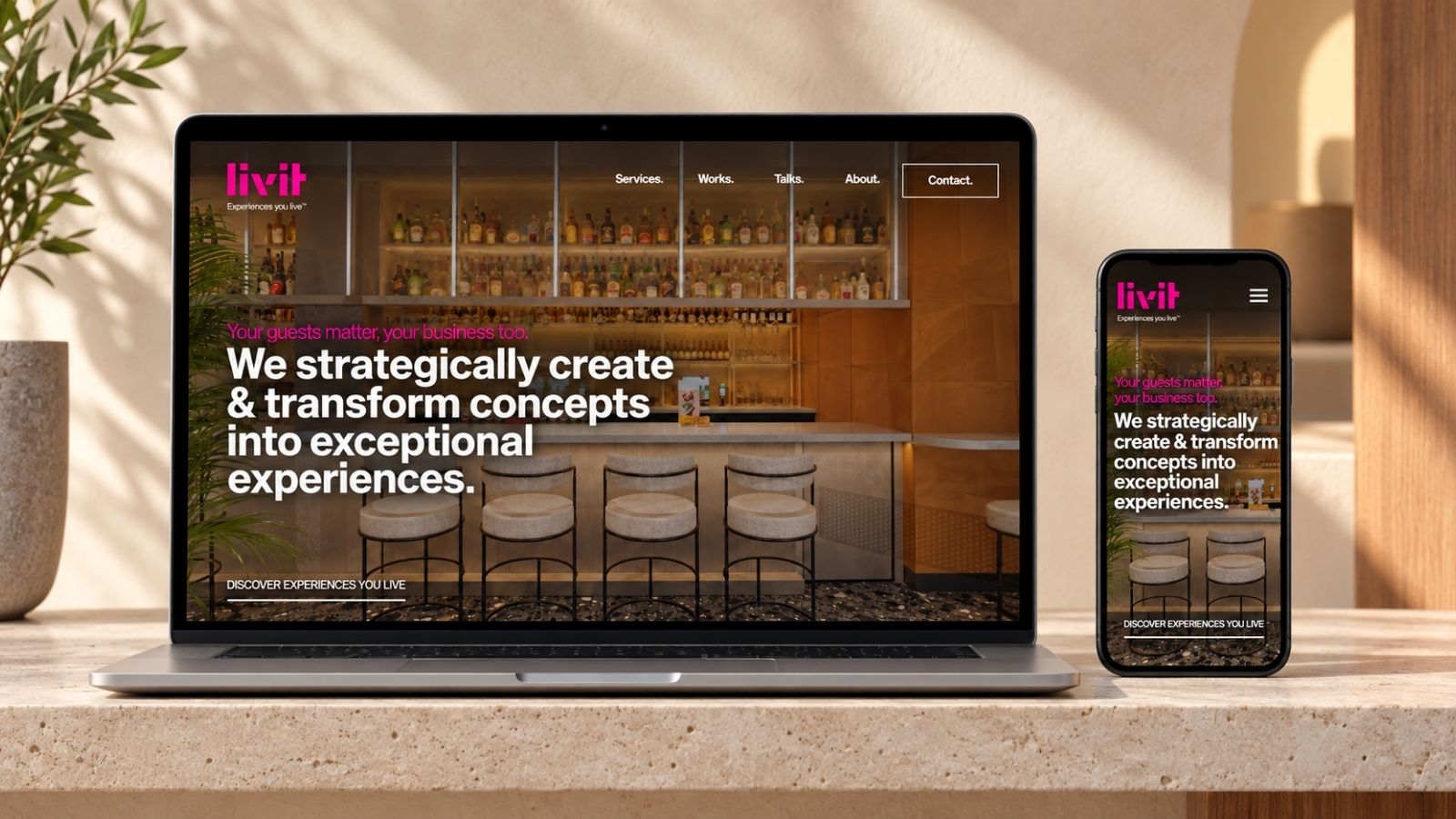 Livit website displayed on a laptop and phone.