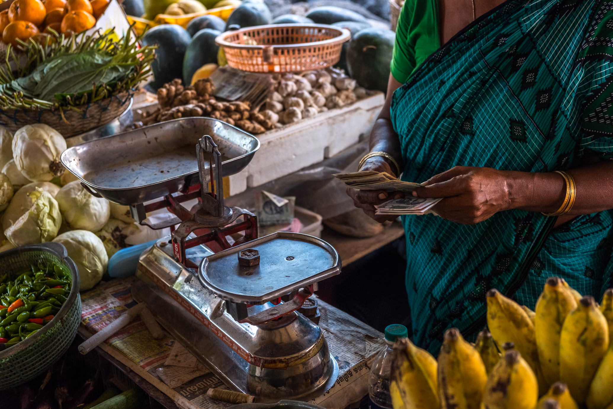 Woman selling in an Asiatic marketplace