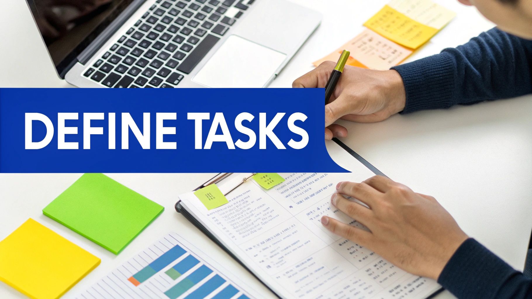 A desk with a notepad and pen, where someone is brainstorming tasks to delegate.