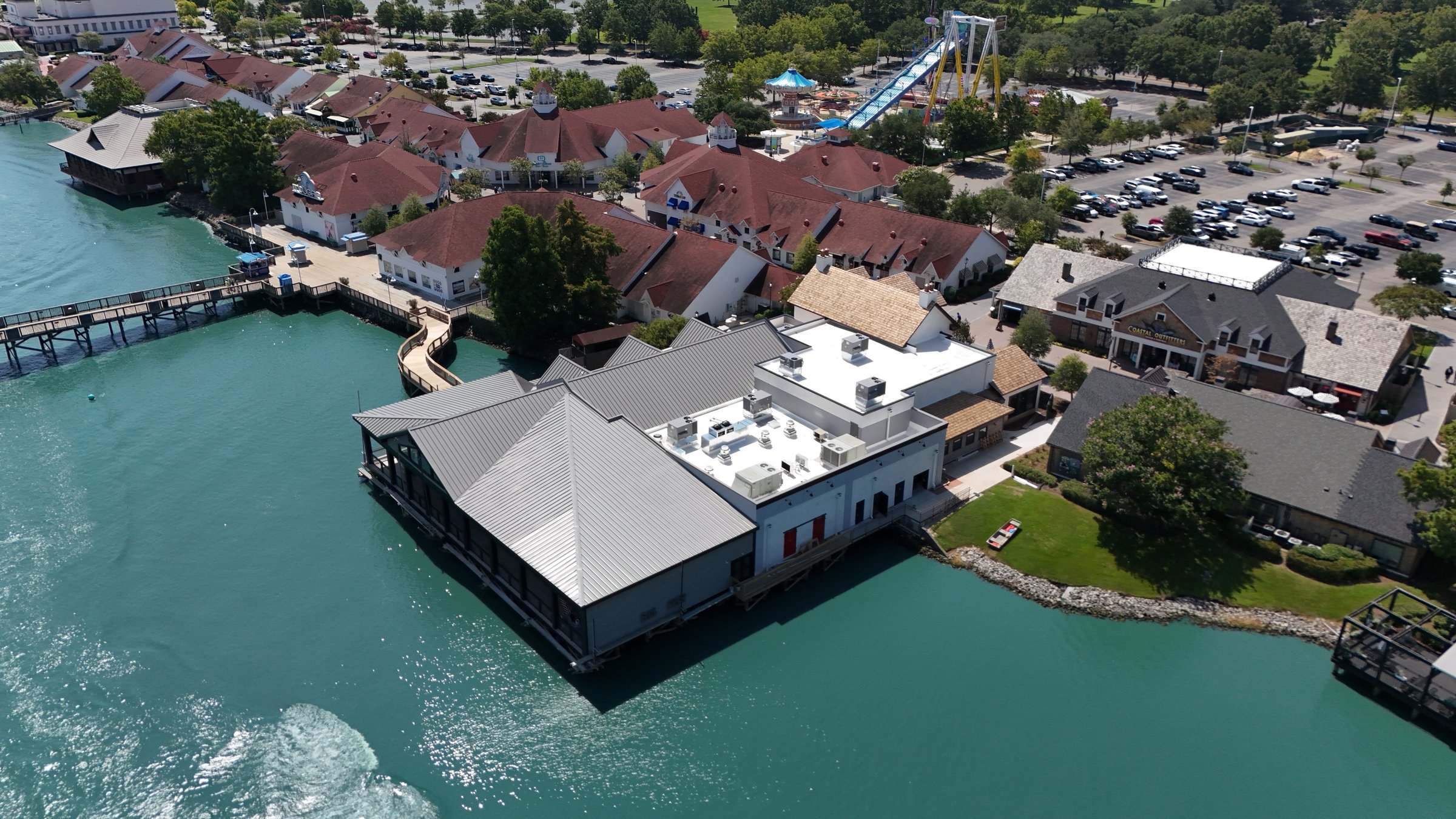 Aerial view of a commercial building with a metal roof in Conway, SC.
