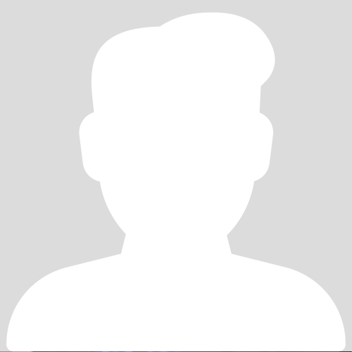 A white silhouette of a man's head.