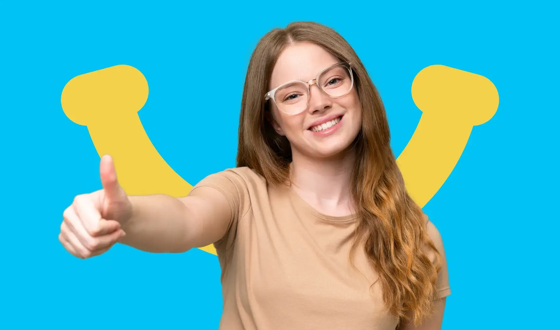 Young woman with glasses gives a thumbs-up and smiles against a bright blue background.
