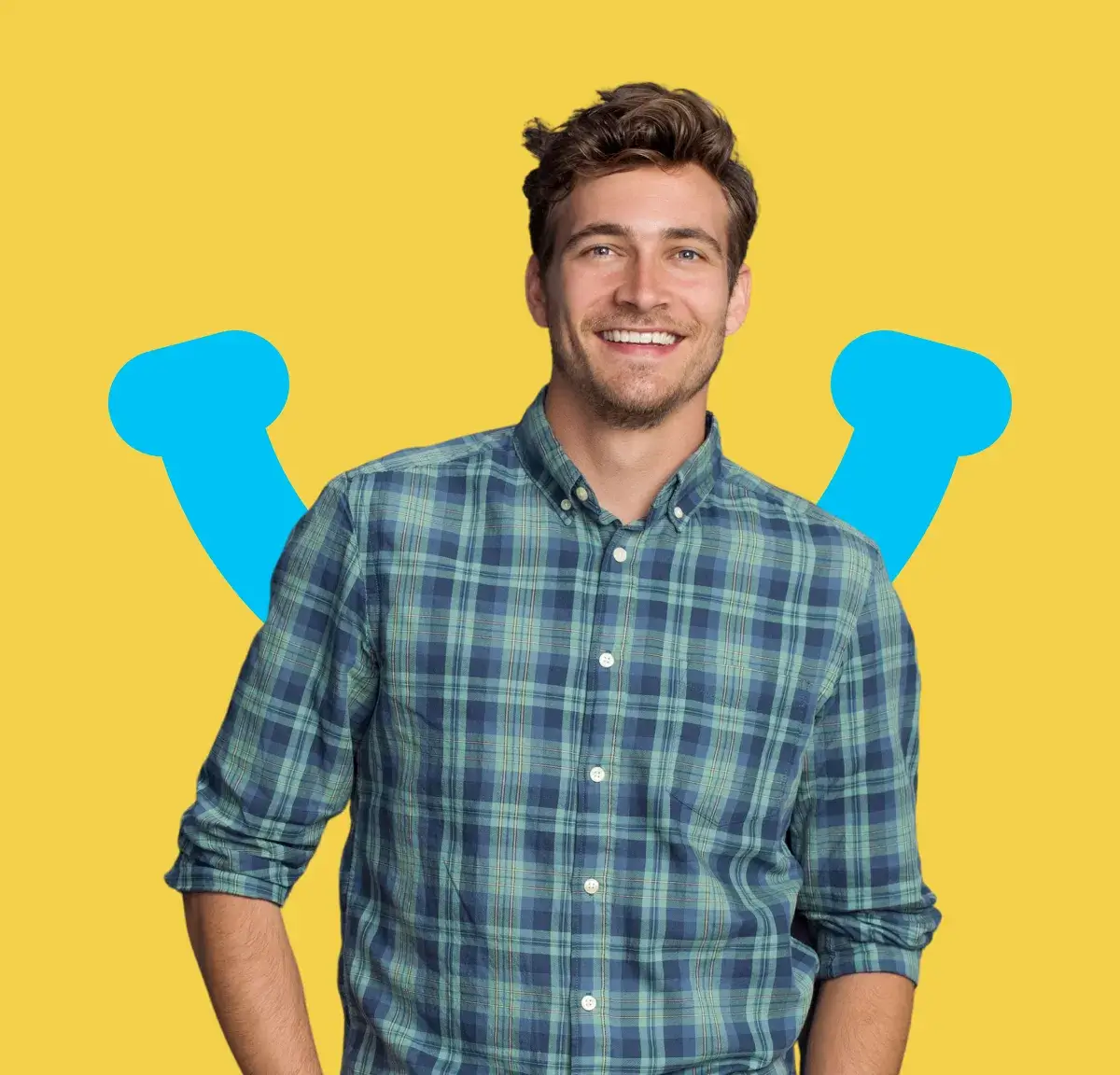 Smiling man in a plaid shirt standing in front of a yellow background with blue accents.