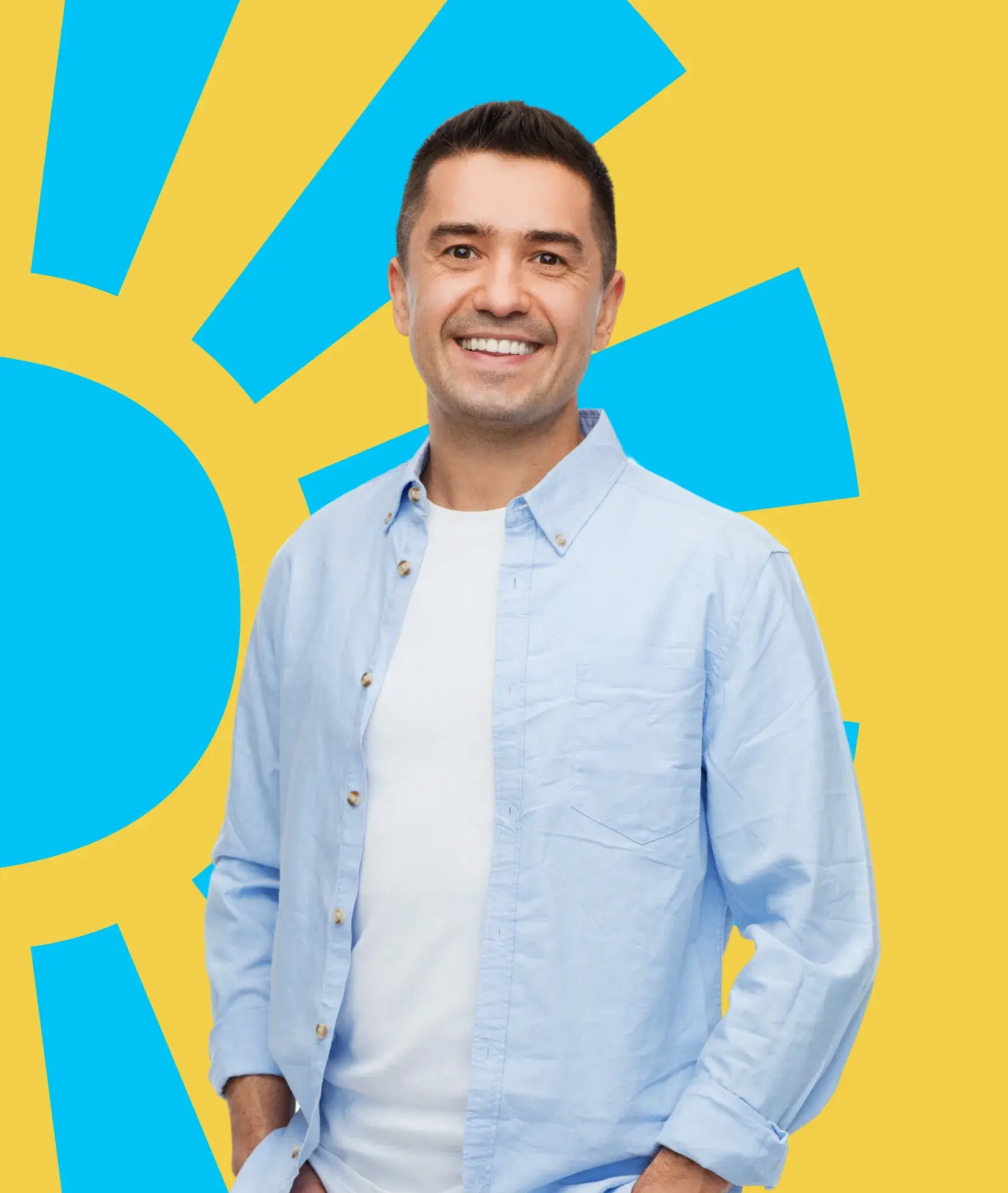 A person is smiling, wearing a light blue shirt, standing in front of a bright graphic background.