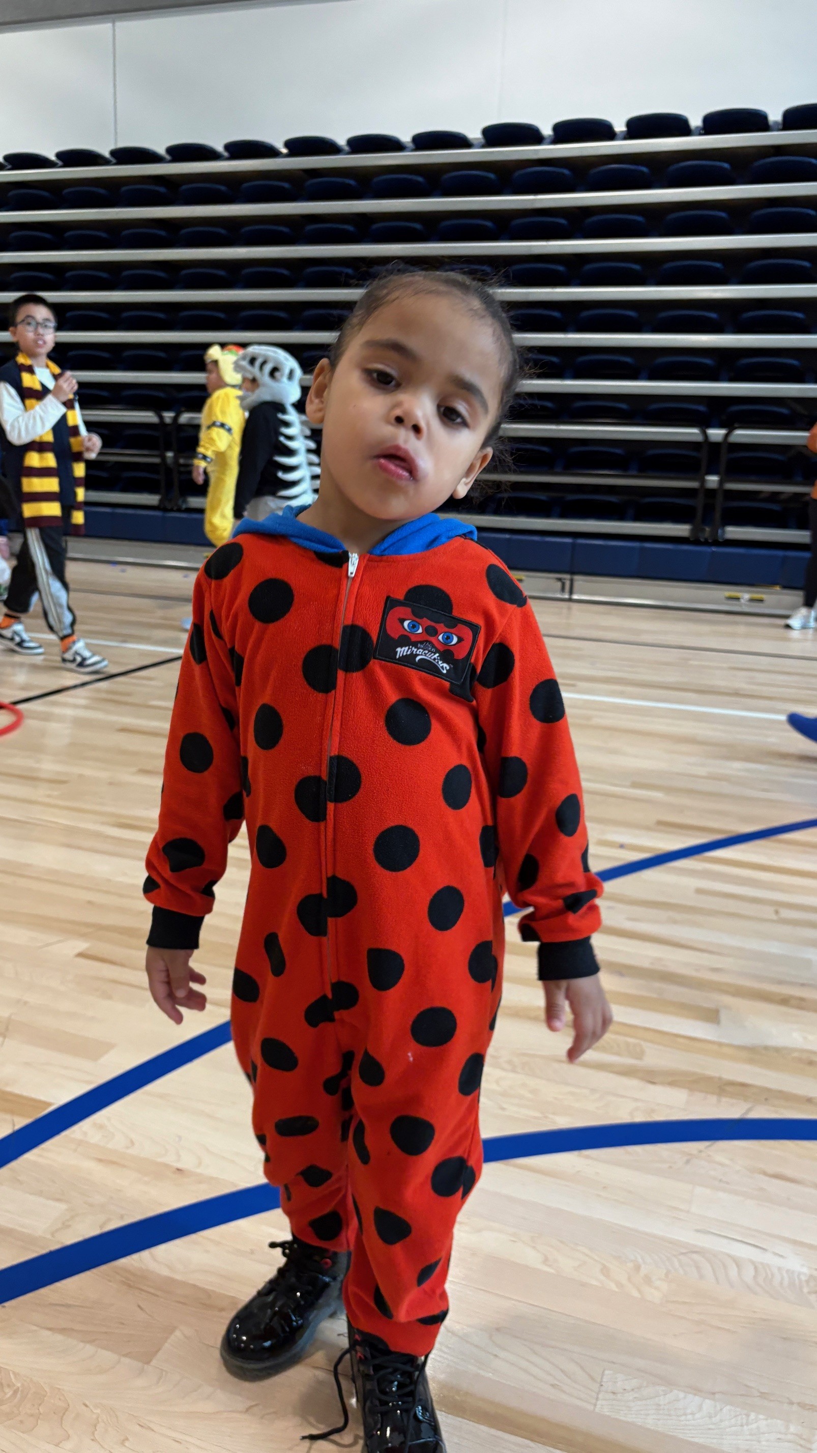 Kid Standing in red dress