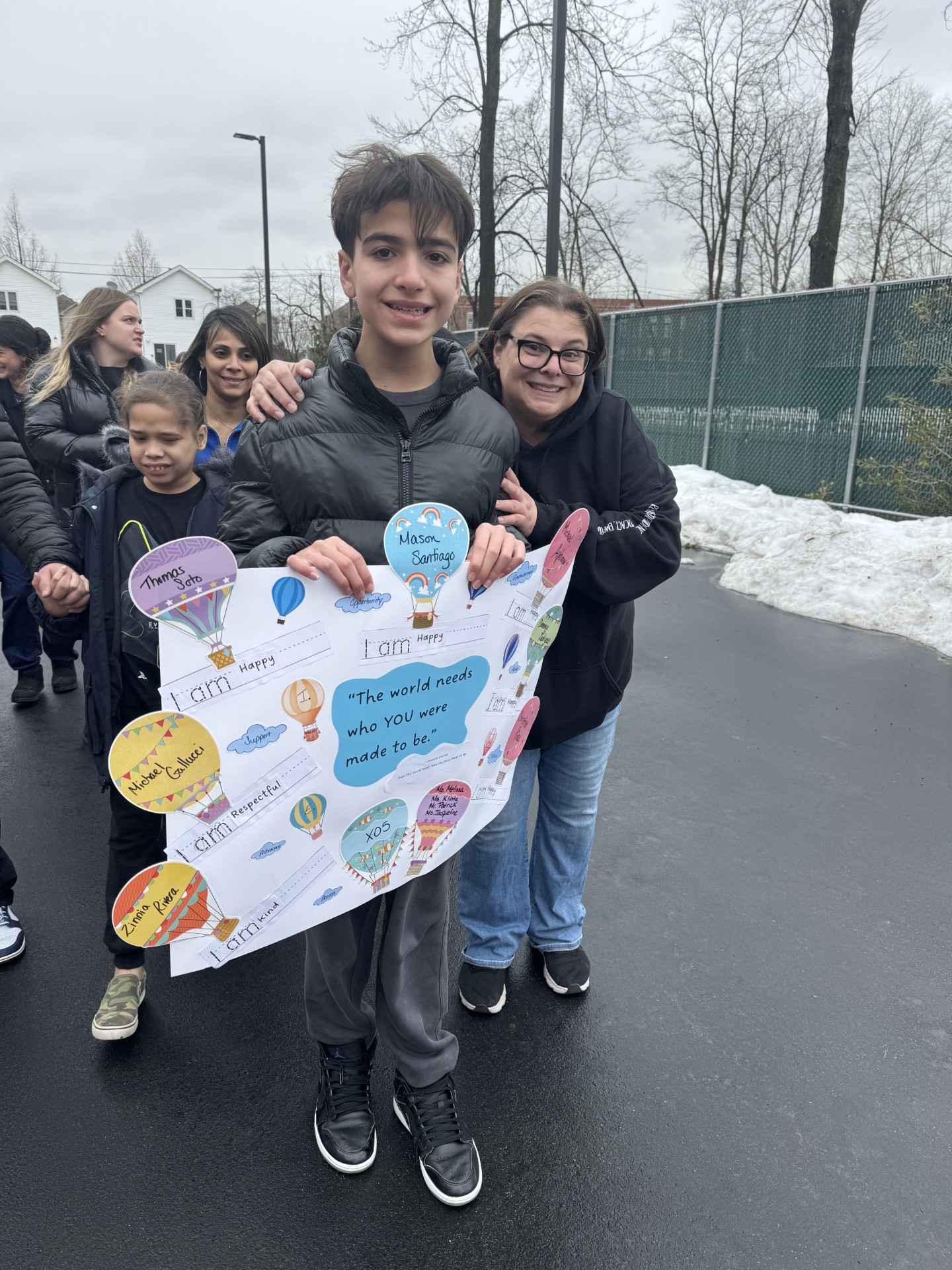 Kids with teacher on road