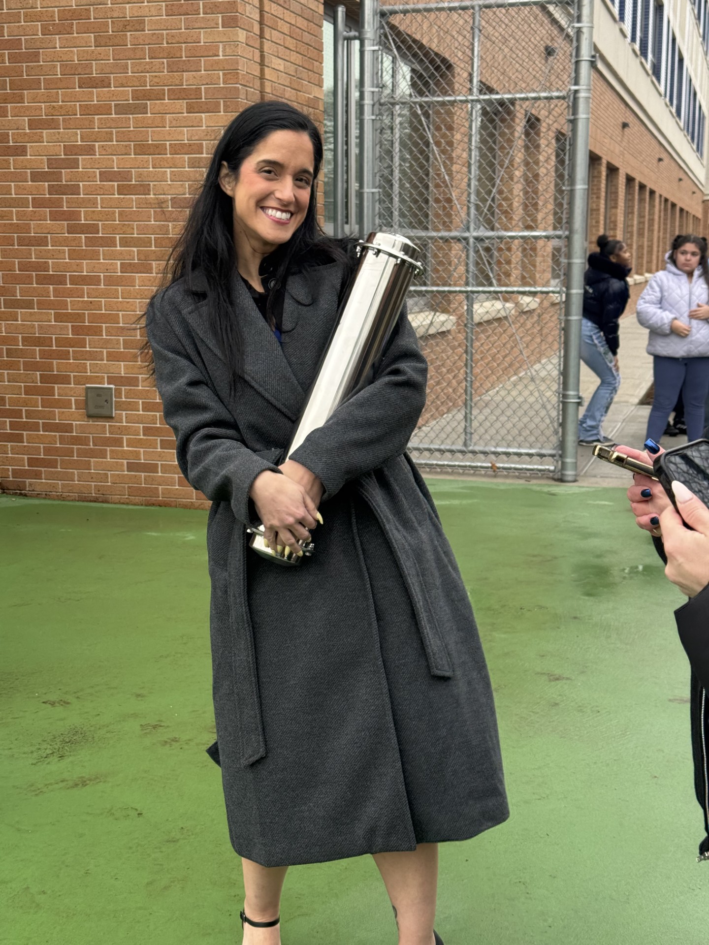Kids with teacher on road