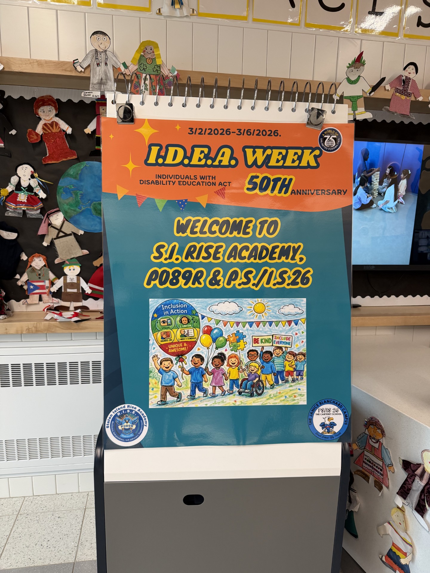 Kids with teacher on road