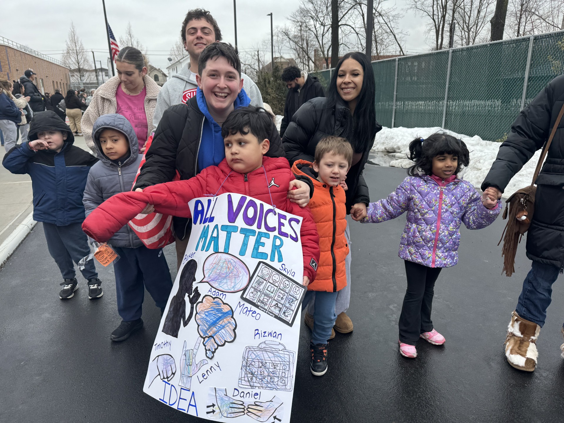 Kids with teacher on road