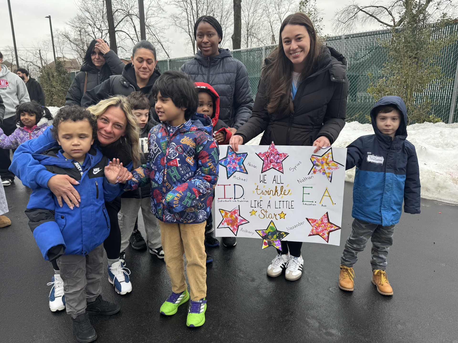 Kids with teacher on road