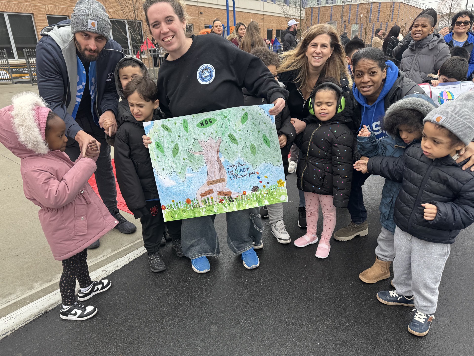 Kids with teacher on road