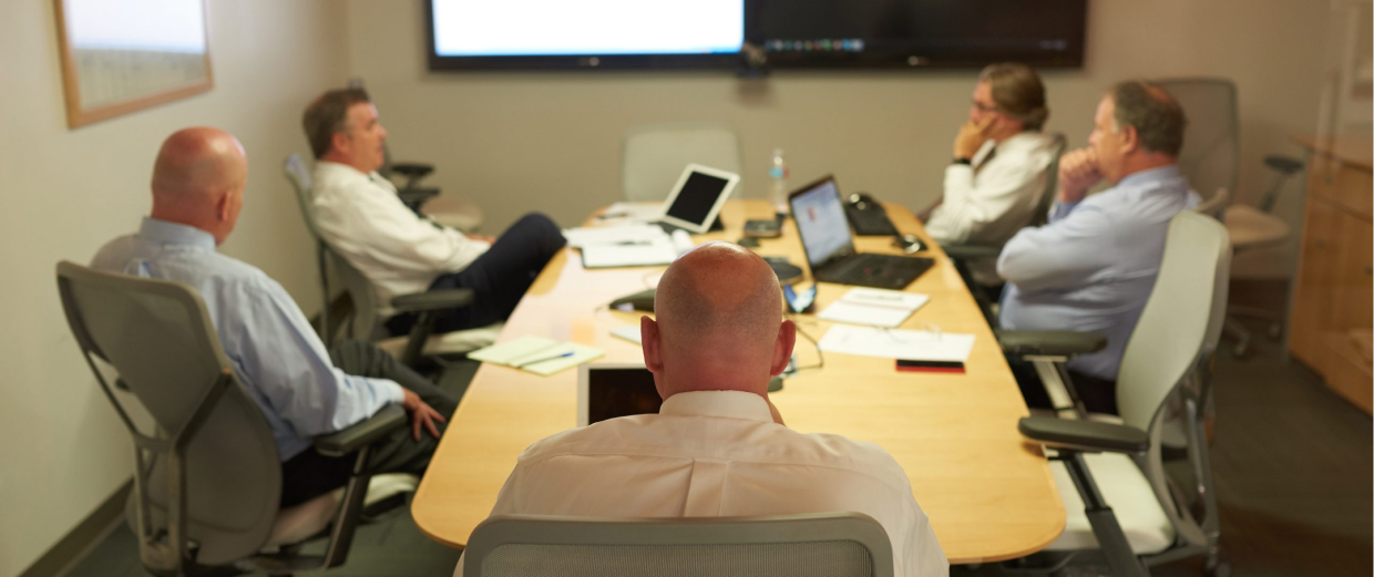 Photo of boardroom of team members