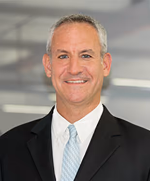 An image of O'Neil Securities Sales Trader Daryn Bourbin.