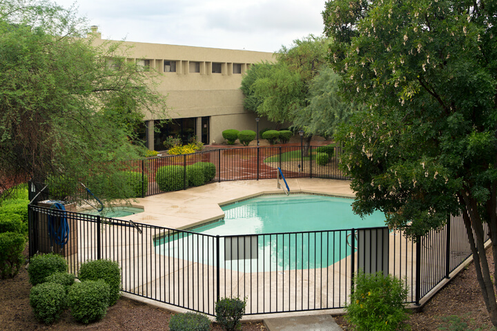 Swimming pool within the landscaped courtyard — view 2 at LifeStream at Glendale.