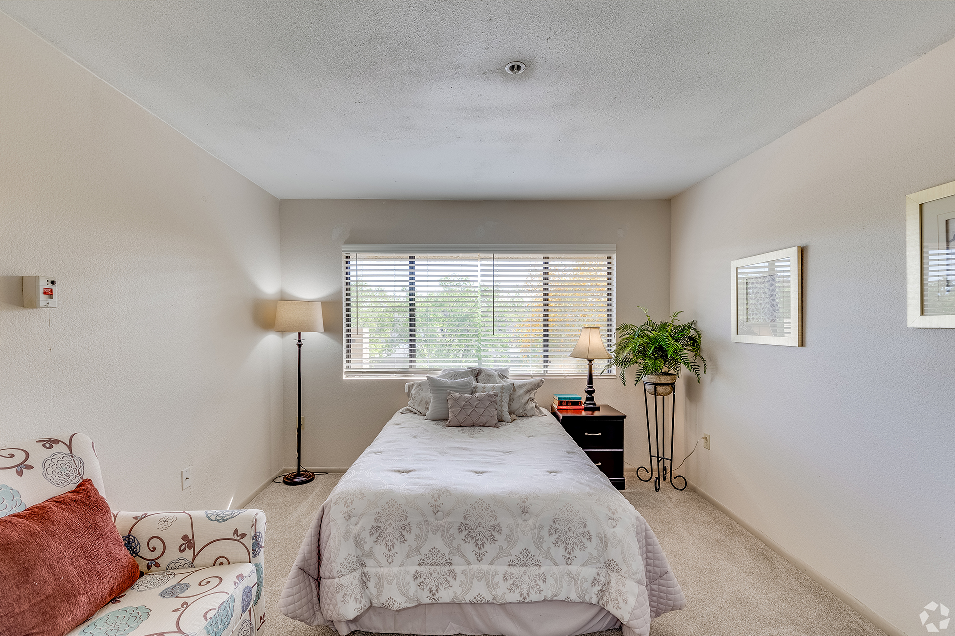 Furnished bedroom with a window — view 2 at LifeStream at Glendale.