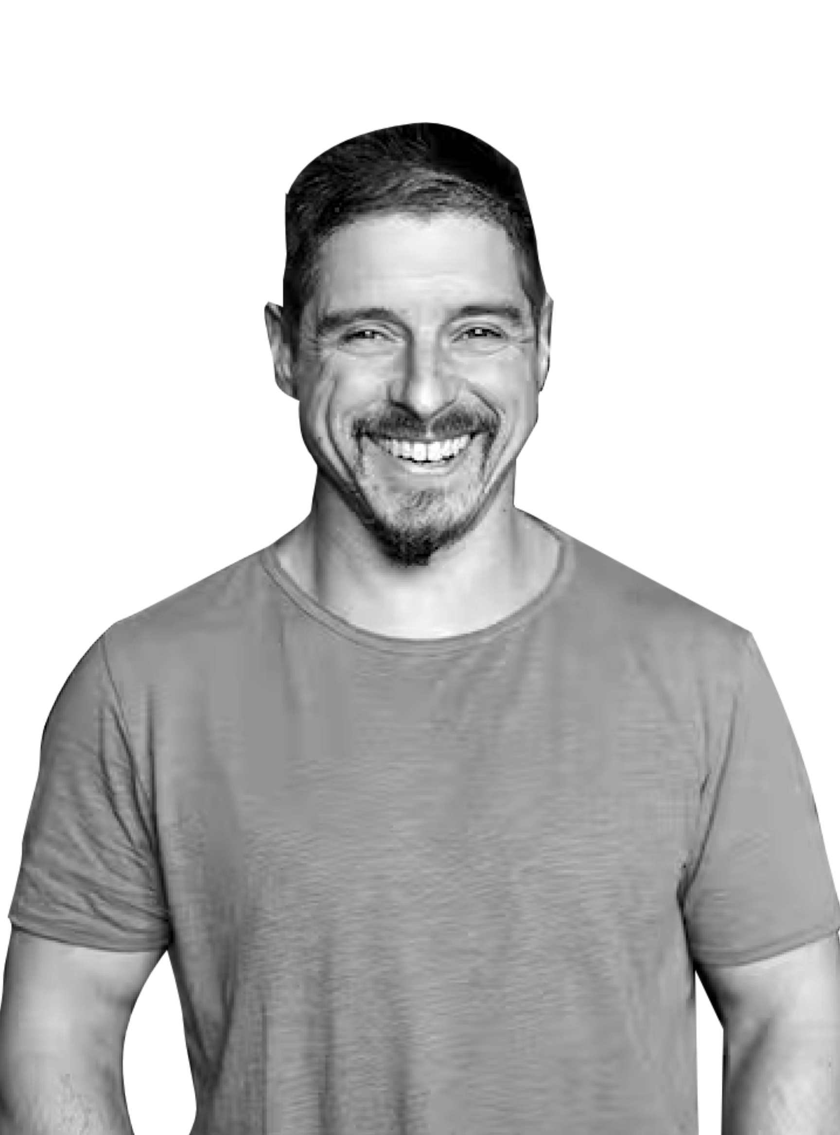 Homme souriant avec une barbe et une moustache portant un t-shirt à manches courtes.