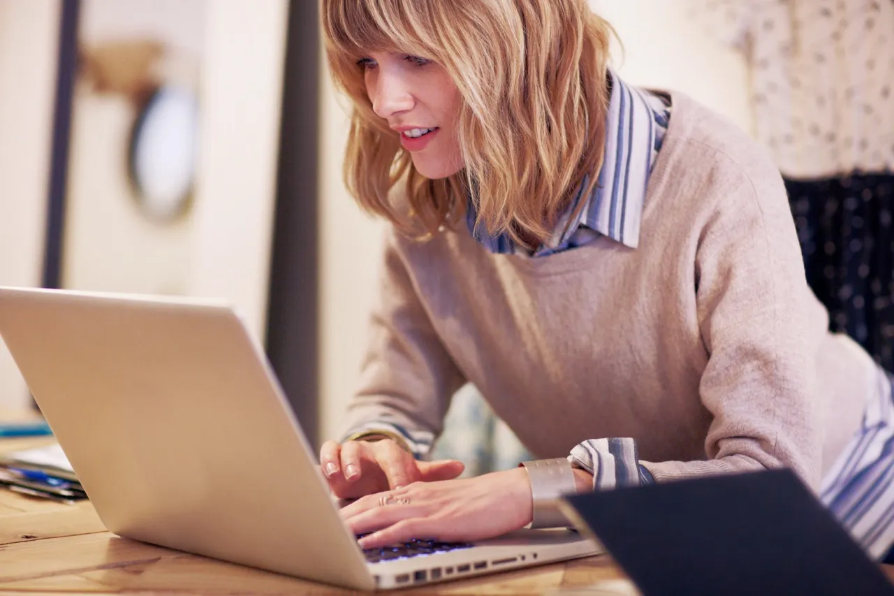 Woman focused and working hard on her computer