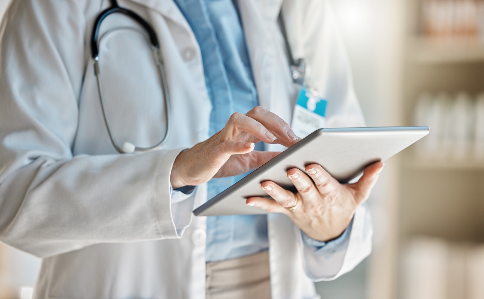 doctor using tablet in healthcare center or clini