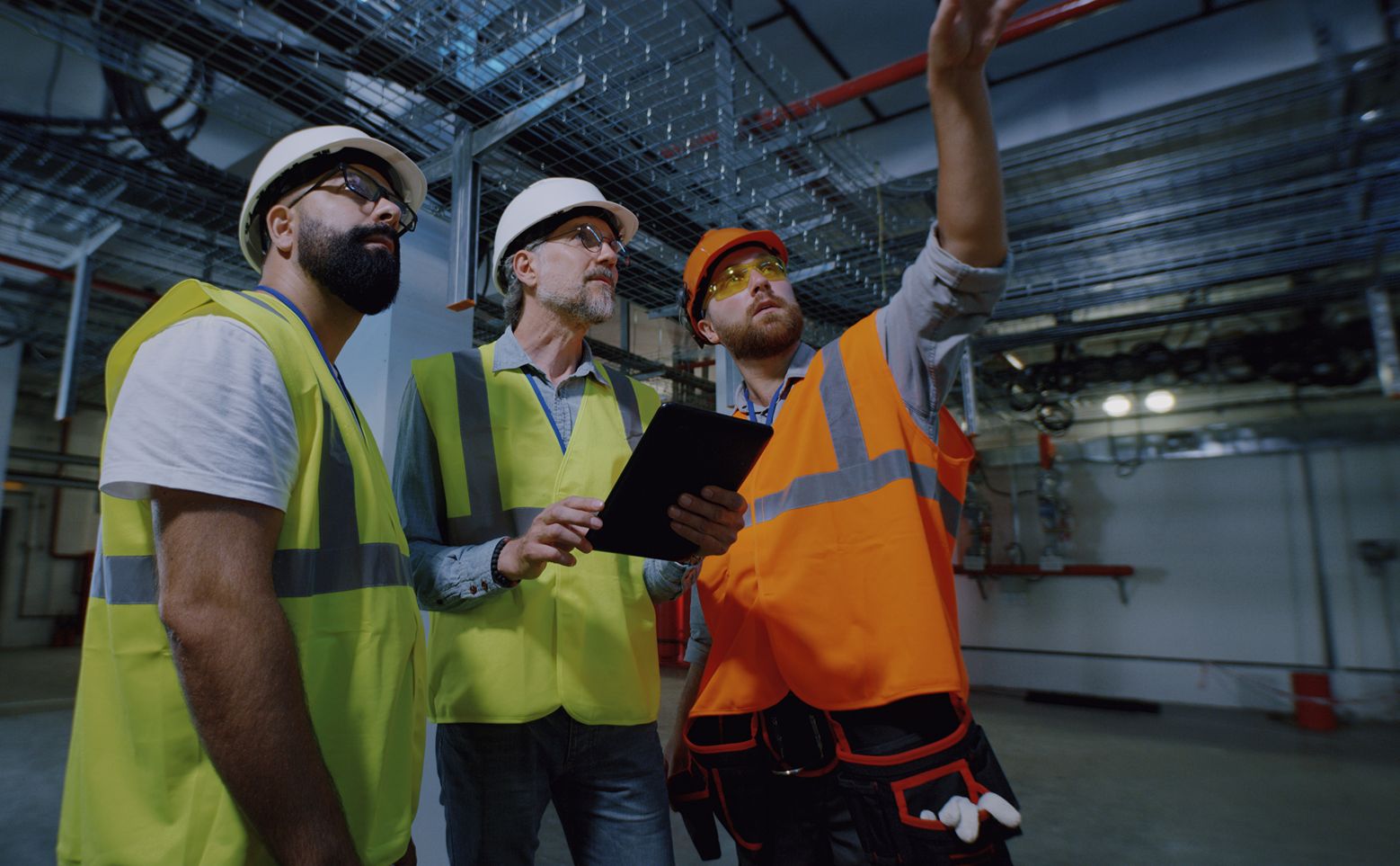 Engineers inspecting industrial space