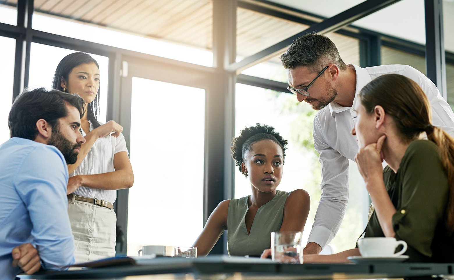 Group of colleagues working together in an office.