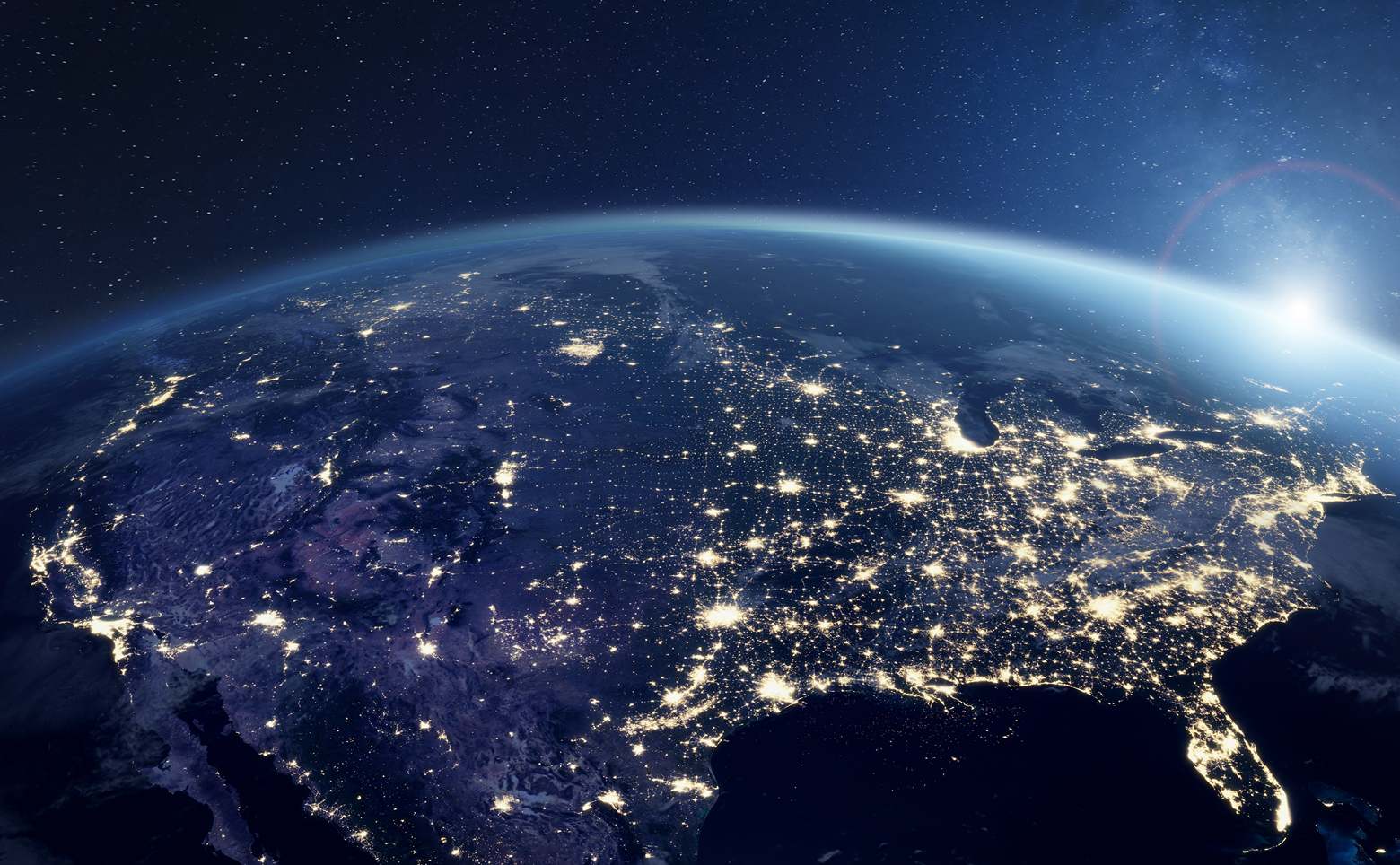 America at night viewed from space with city lights showing activity in United States
