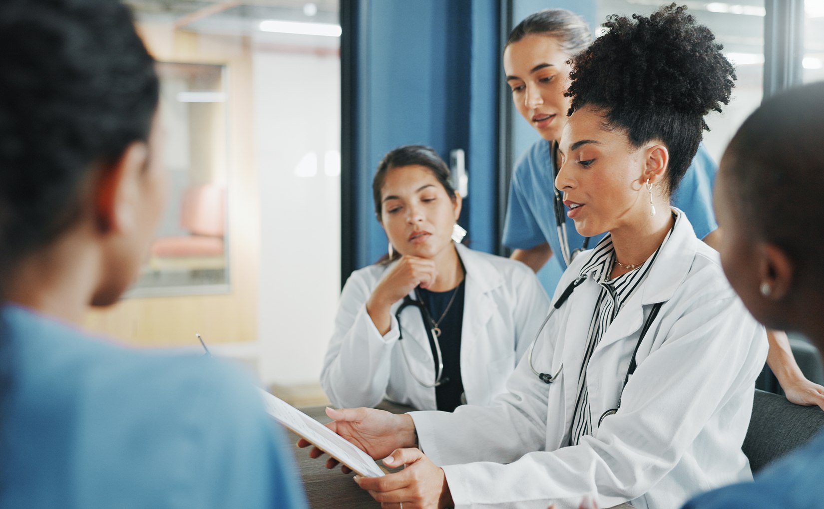 Doctors and nurses in meeting, collaboration or teamwork for hospital planning