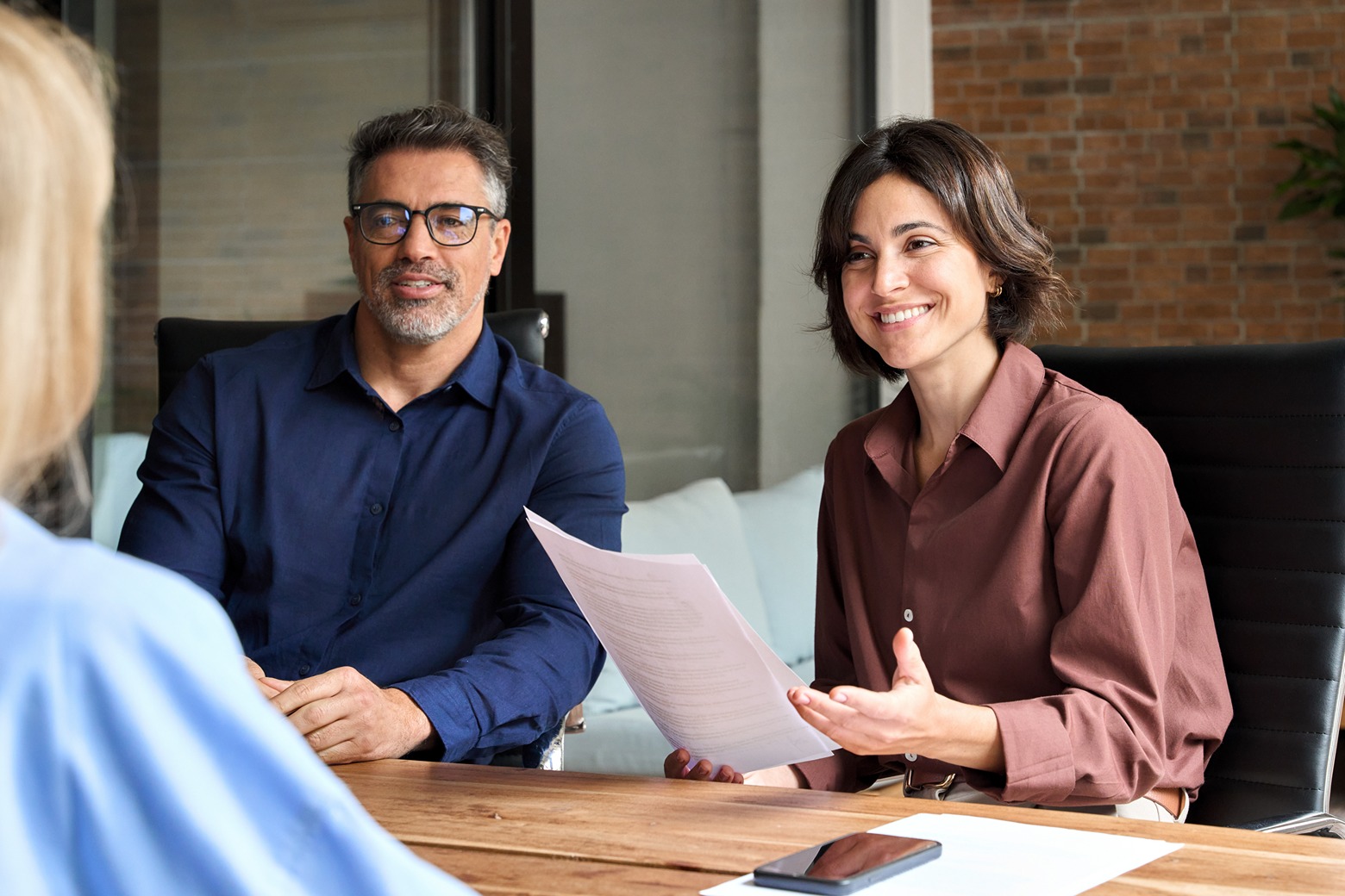 corporate recruitment team talking at group meeting