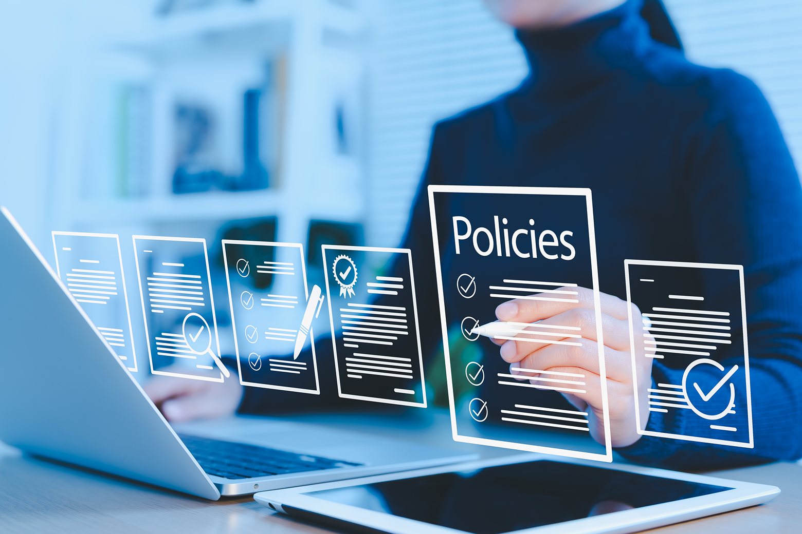 Person at a laptop checking items on a digital policies checklist surrounded by document icons