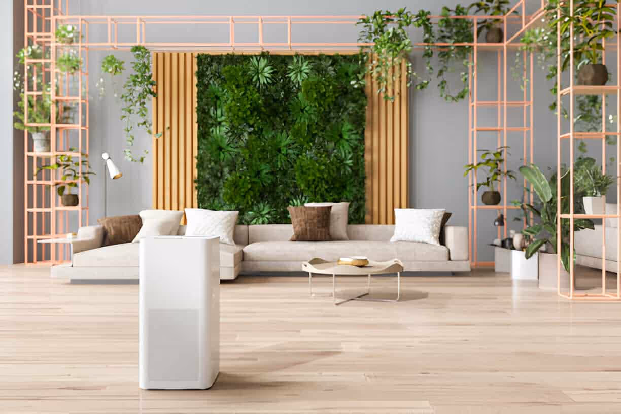 Modern living room with white sofa and lush green vertical garden wall