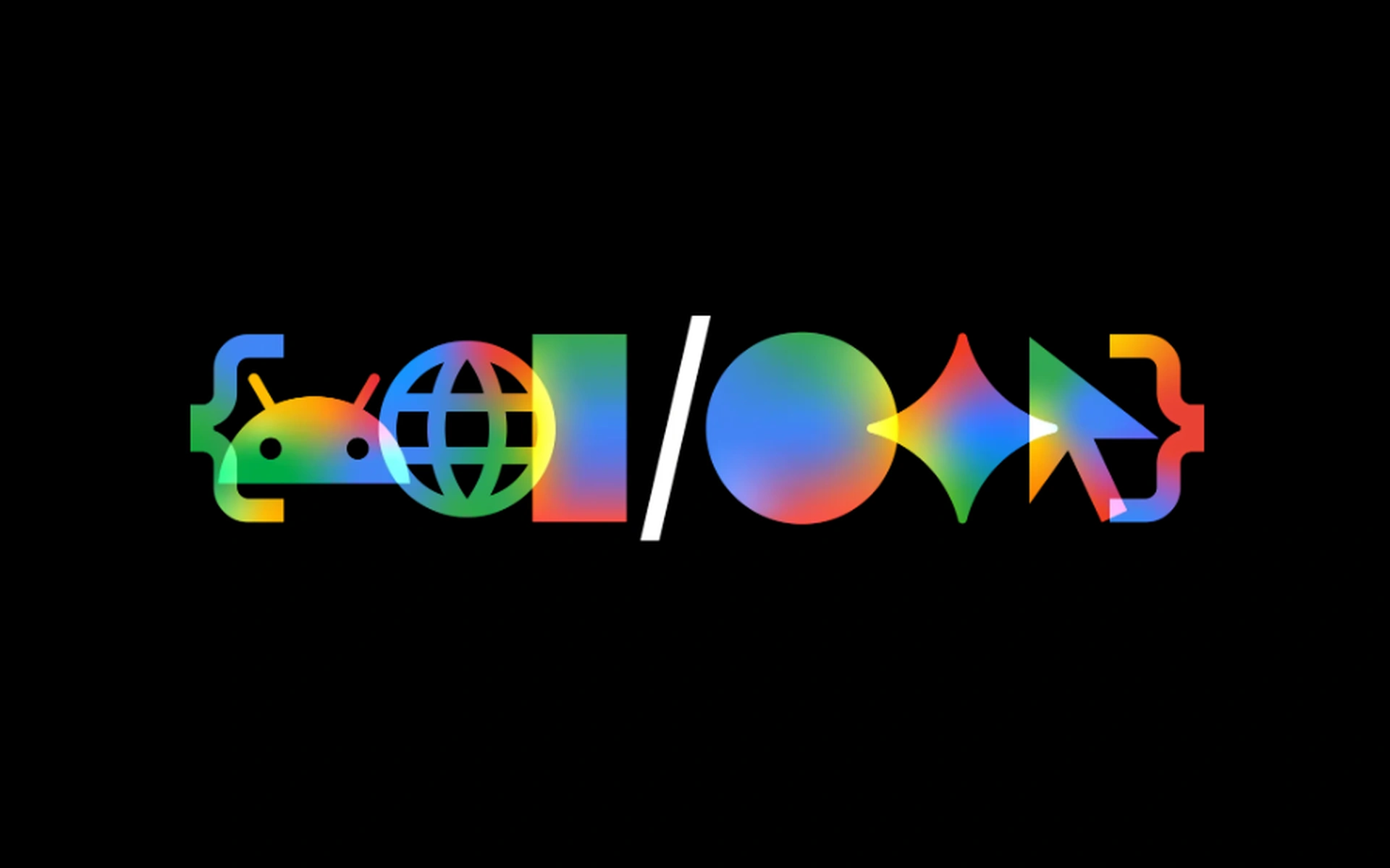 Buntes Google I/O 2026 Logo auf schwarzem Grund mit integrierten Symbolen: Android-Maskottchen, Weltkugel, Smartphone, Kreis, Google-Sparkle, Mauszeiger und geschweifte Klammern.