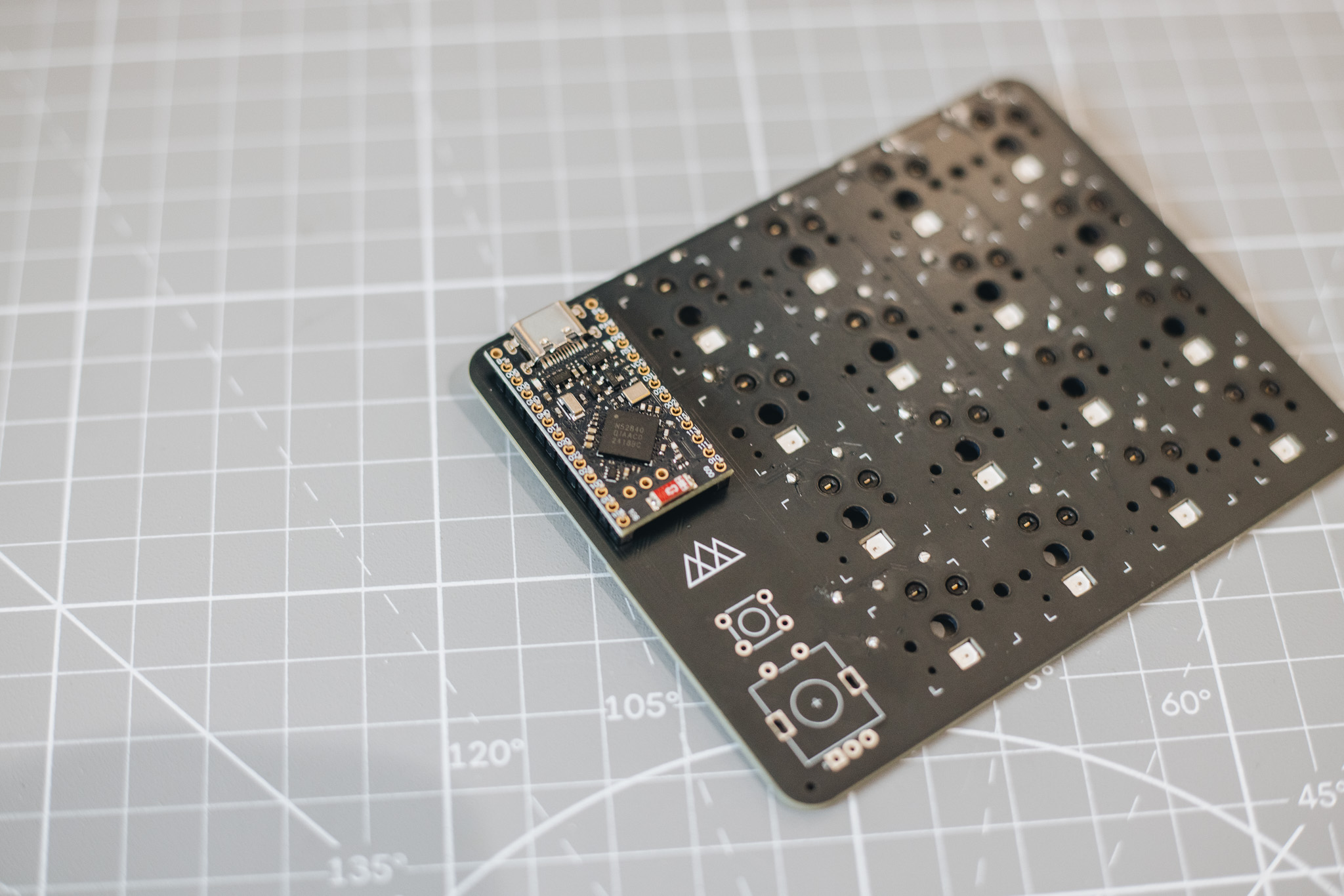 MinimalPad PCB with the microcontroller mounted on its header pins