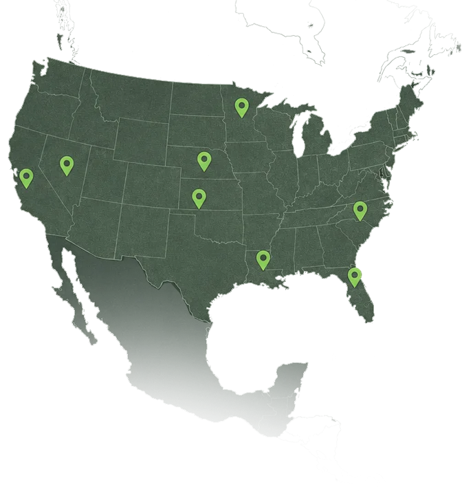 Map of the United States with state boundaries outlined in white, showing green location markers in California, Nevada, Minnesota, Kansas, Oklahoma, Louisiana, Florida, and South Carolina.