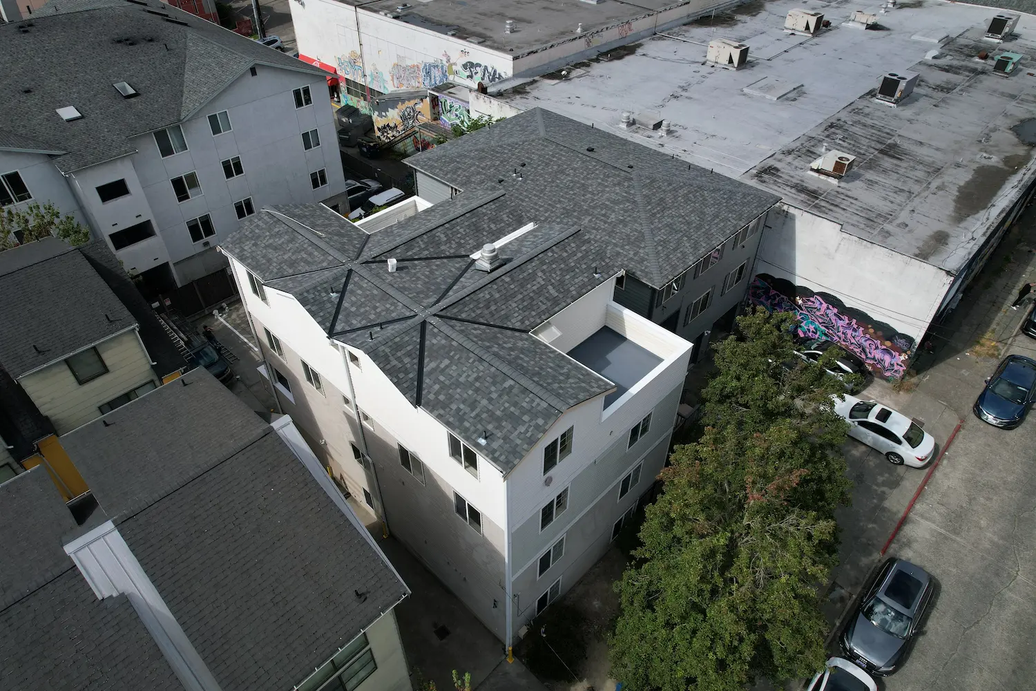 Shingled roof installed by Flat Roof Pros roofing contractor.