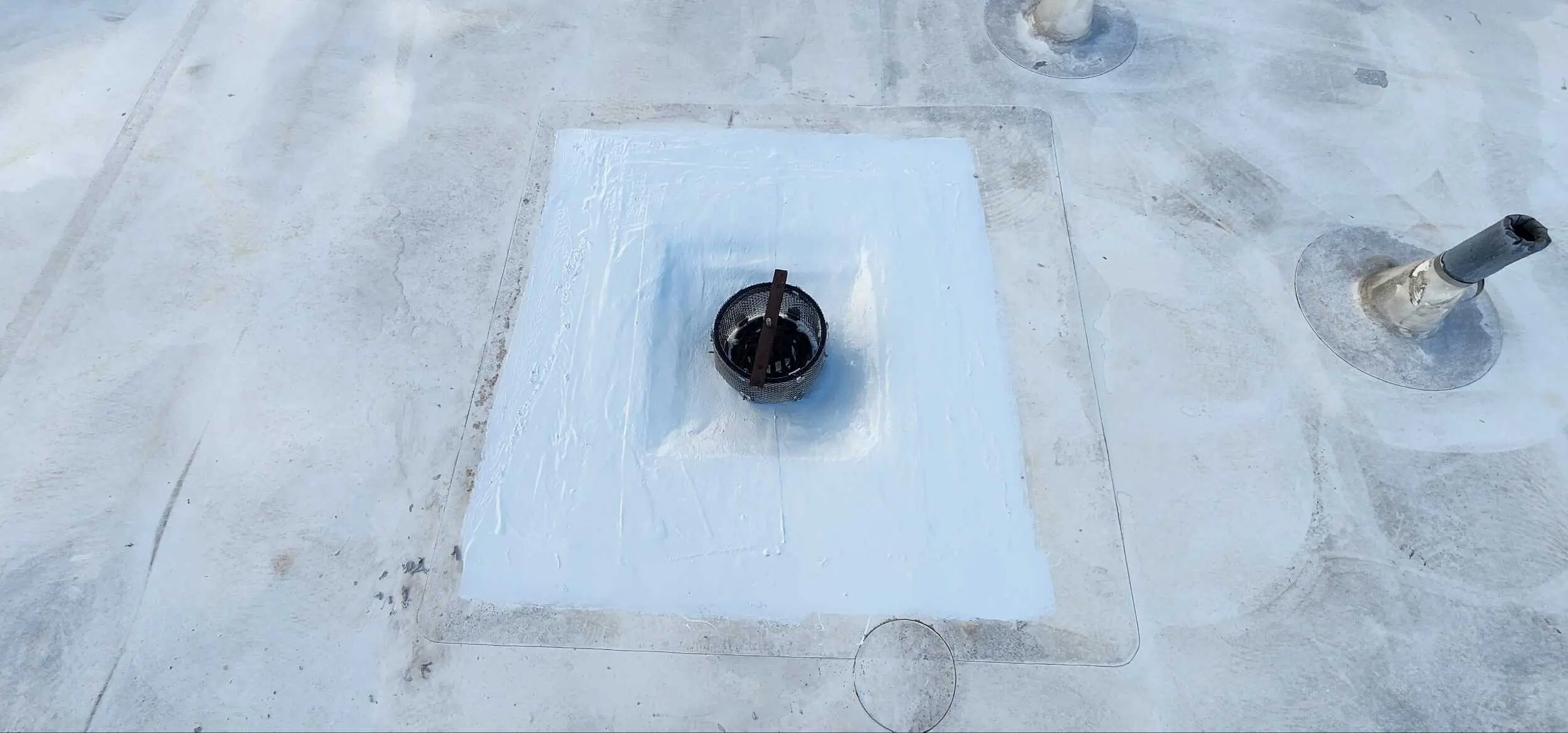 Silicone Seam Sealing applied by Flat Roof Pros roofing contractor.