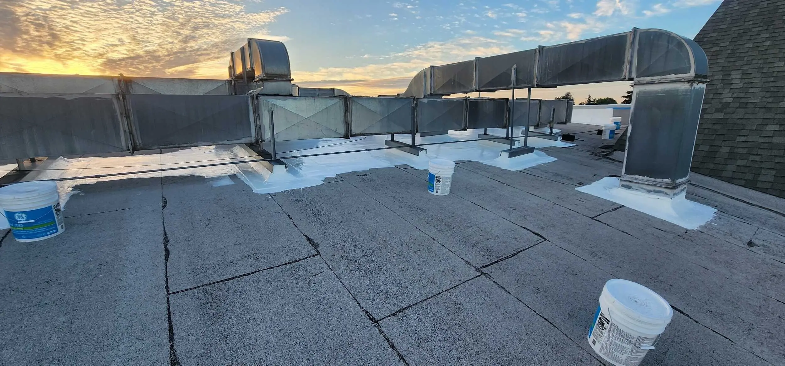 Waterproofed roof details by Flat Roof Pros.