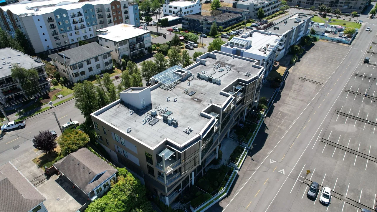 Multi-building condominium property viewed from above for roof inventory and reserve planning.