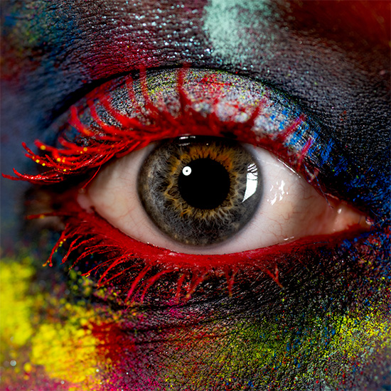 colourful eye makeup with red mascara 