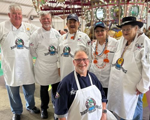 Several ACFNO chefs posing together at an event in New Orleans