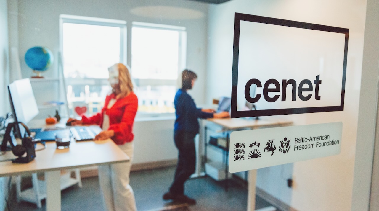 Cenet logo on the glass door of its Portland, Maine office, where team members work on J-1 visa sponsorship.