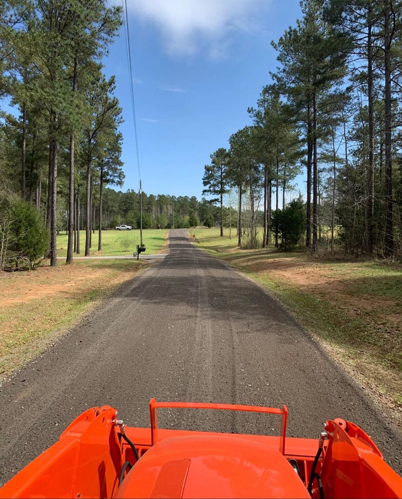 A brand new gravel road during installation.